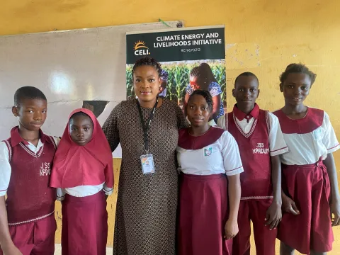 Students with the CELI facilitator by the CELI banner